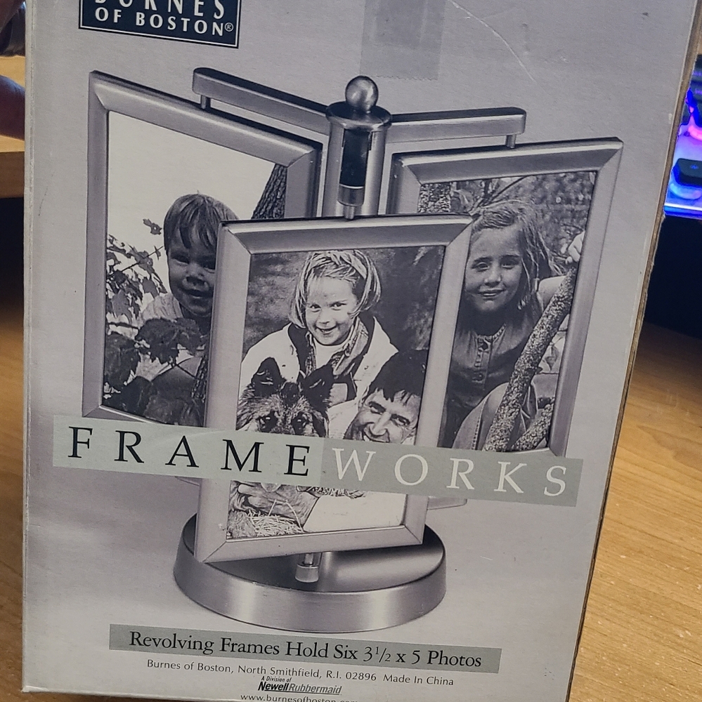 Burnes Of Boston Silver Revolving Photo Frame